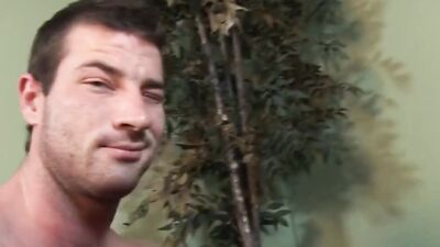 Buff hunk jerks off before another guy joins for blowjobs