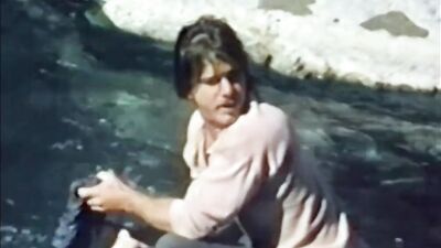 Vintage video of two guys shagging out in the open