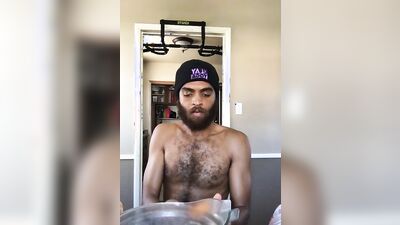 Rock Mercury is filming himself while his making a shake