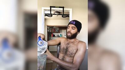 Rock Mercury is filming himself while his making a shake