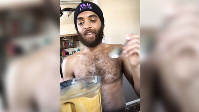 Rock Mercury is filming himself while his making a shake