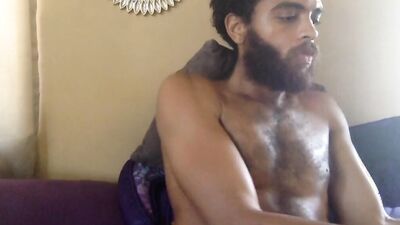 Cute and hairy guy with a sexy beard jerks off solo