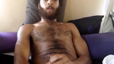 Cute and hairy guy with a sexy beard jerks off solo