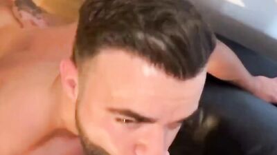 Bearded man swallows two cocks and offer his ass for some drilling