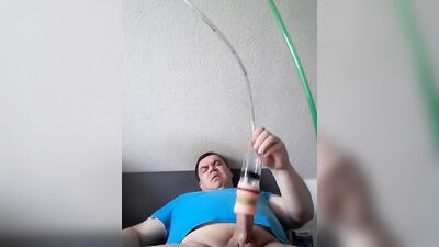 Chubby guy enjoys having his cock stimulated with that dick-pump