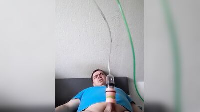 Chubby guy enjoys having his cock stimulated with that dick-pump