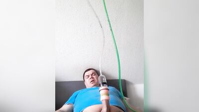 Chubby guy enjoys having his cock stimulated with that dick-pump