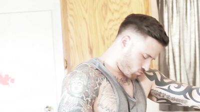 Twink sits on tattooed man's dick and rides it like a pony