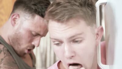 Twink sits on tattooed man's dick and rides it like a pony