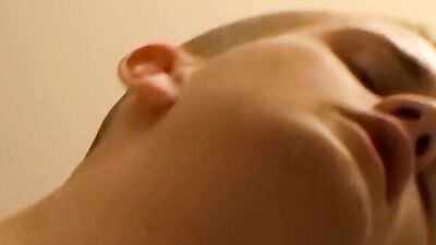Bryce Corbin is smoking a cigar while polishing his cock