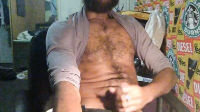 ROCK MERCURY JERKS HIS HUGE HAIRY DICK LATE NIGHT IN HOME OFFICE BALLS BOUNCE CUMS ON SEXY PUBES