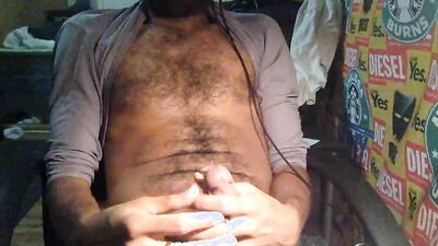 ROCK MERCURY JERKS HIS HUGE HAIRY DICK LATE NIGHT IN HOME OFFICE BALLS BOUNCE CUMS ON SEXY PUBES