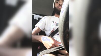 Rock Mercury plays with his big dick inside the car