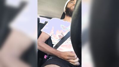 Rock Mercury plays with his big dick inside the car