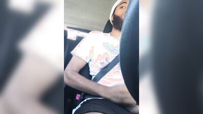 Rock Mercury plays with his big dick inside the car