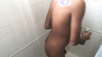 Rock Mercury is posing naked and taking a hot shower