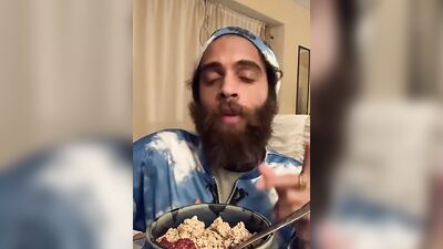 Bearded lad Rock Mercury is chatting with his fans while stuffing