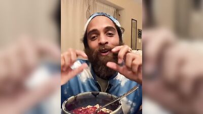 Bearded lad Rock Mercury is chatting with his fans while stuffing