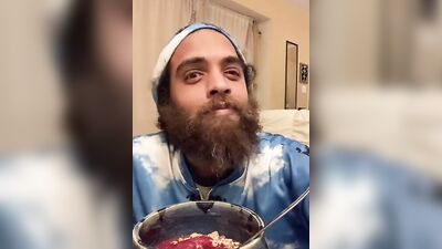 Bearded lad Rock Mercury is chatting with his fans while stuffing