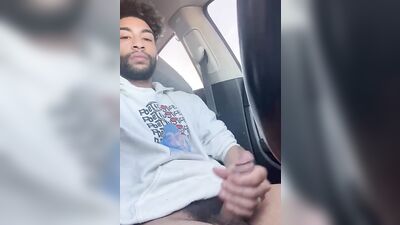 Dude gets horny in the car and plays with his hard pecker