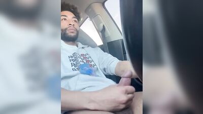 Dude gets horny in the car and plays with his hard pecker
