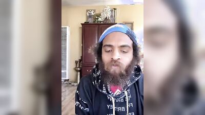 Cute guy with a sexy beard has fun reviewing food