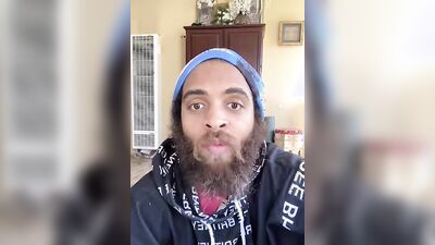 Cute guy with a sexy beard has fun reviewing food
