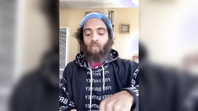 Cute guy with a sexy beard has fun reviewing food
