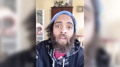 Cute guy with a sexy beard has fun reviewing food