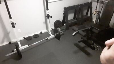 Kinky chubby guy strips naked and exercises in the gym