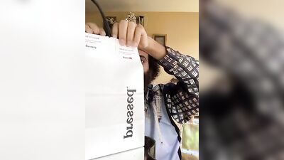 Dashing guy with a sexy beard does a juicer review
