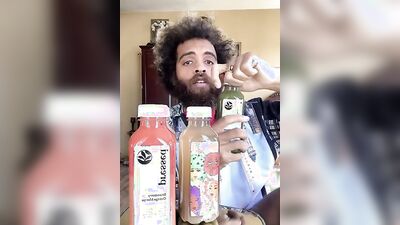 Dashing guy with a sexy beard does a juicer review
