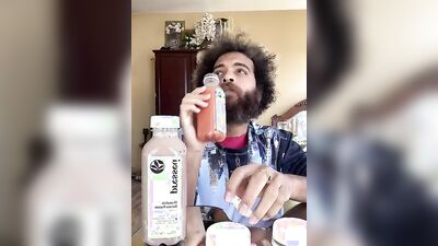 Dashing guy with a sexy beard does a juicer review