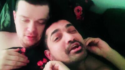 Two horny guys are passionately kissing in this anal sex video