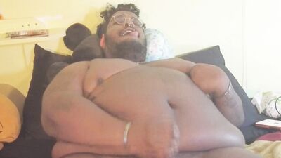 Fat black guy has cock rings while jerking off solo