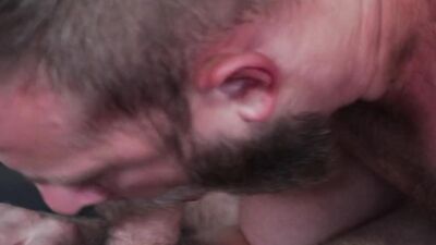 Chase Ryder and another bearded guy in a raw gay sex video