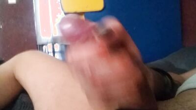 Inked man grabs his dick to stroke it for the camera