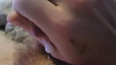 Hairy guy plays with his cock, jizzes, pisses and films it all