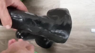 Freaky guy tries on different extensions to drill his ass with sex machine