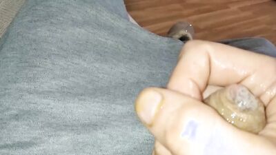Kinky guy rubs honey all over his cock and masturbates