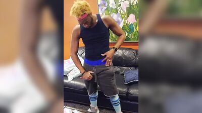Horny black lad jerks off and white guy jizzes on his face