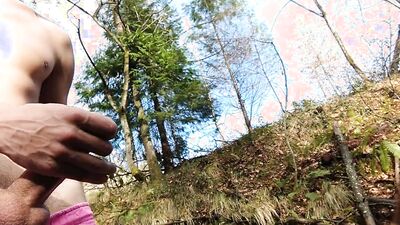Kinky lad takes his cock out in the woods and jerks off