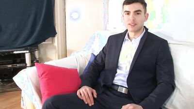 Handsome lad is rubbed with oil while playing with his hard dick