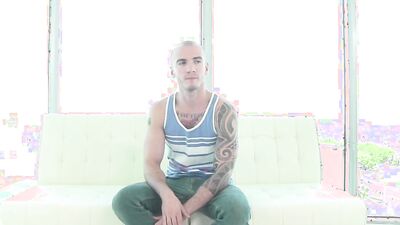 Inked blonde chum is stroking his dick while being fucked in the ass