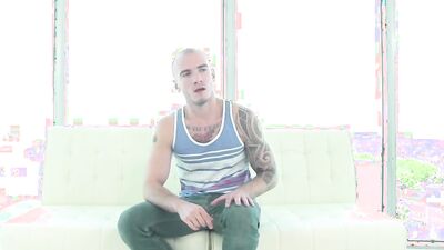 Inked blonde chum is stroking his dick while being fucked in the ass