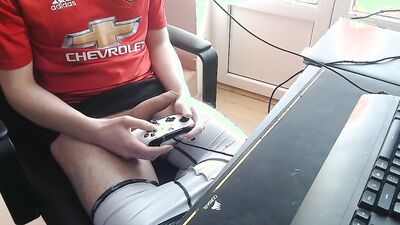 Horny guy touches his cock while playing a video game