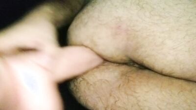 Hairy guy is stretching his ass with a humongous sex toy