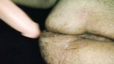 Hairy guy is stretching his ass with a humongous sex toy