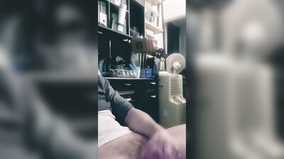 Horny lad films himself with a cellphone while jerking off