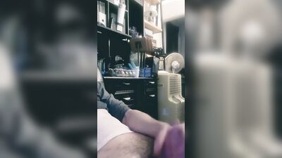 Horny lad films himself with a cellphone while jerking off